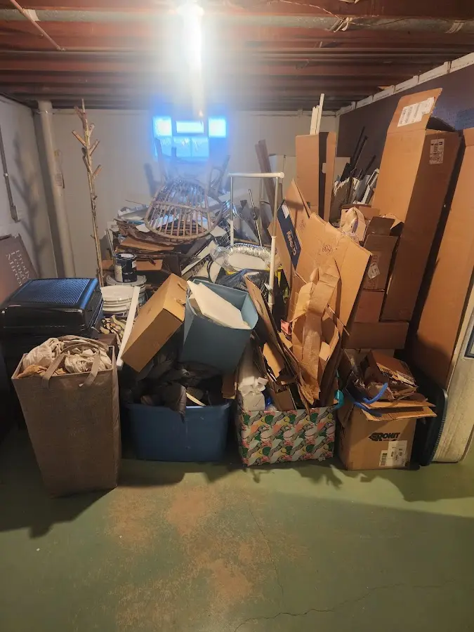 Roll-off dumpster container at job site for 2 Yard Dumpster Rental in Wilmington Manor